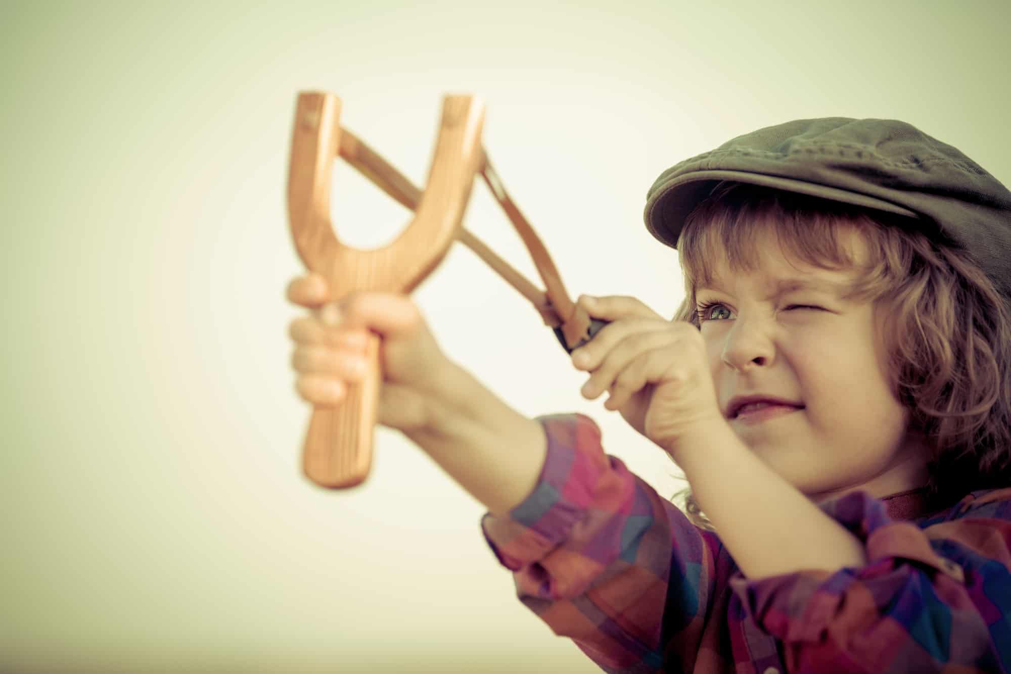 Kid holding slingshot » ActiveNow